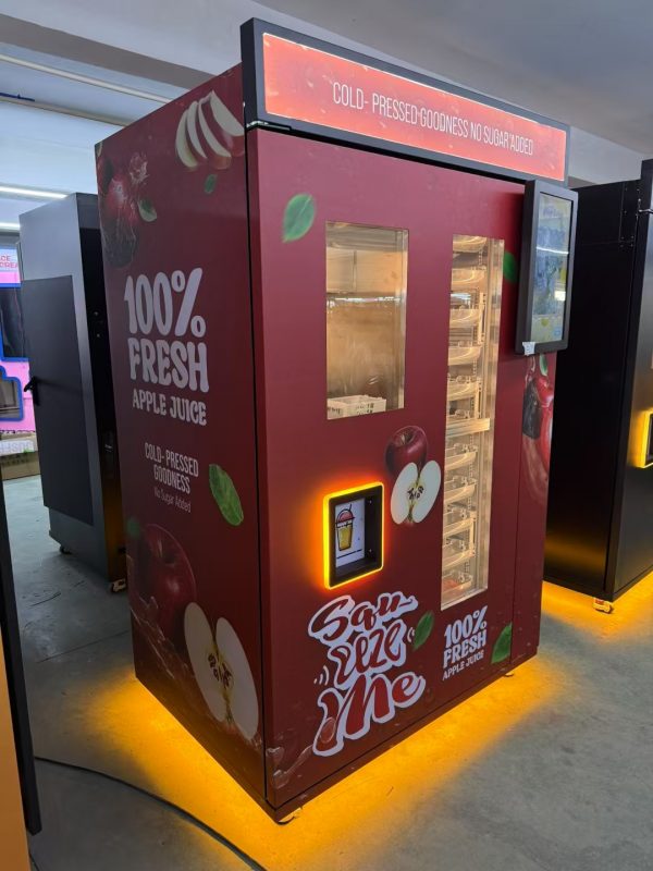 Fresh apple juice vending machine with touchscreen interface