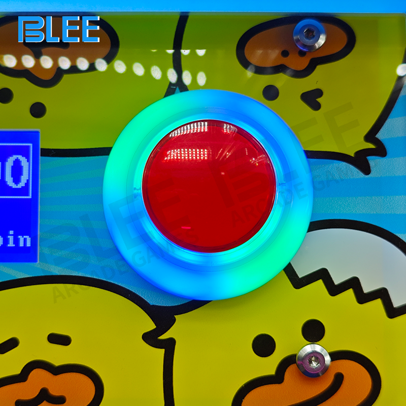 Desktop claw machine with joystick and coin slot