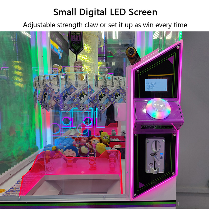 Arcade-style clip game machine with coin slot and prize