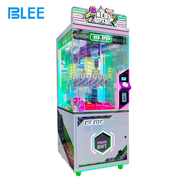 Arcade clip game machine with joystick and prize display