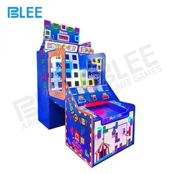 players throwing balls into illuminated cube targets