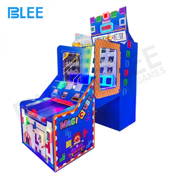 family playing Magic Cube ticket redemption game
