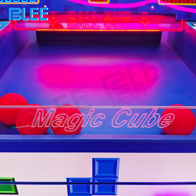 family playing Magic Cube ticket redemption game