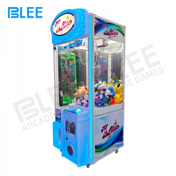 Coin-operated prize claw machine in game center