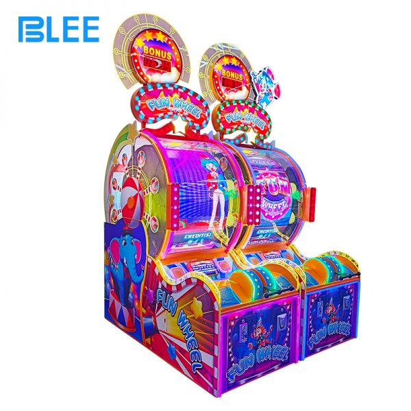 fun wheel game machine with colorful LED lights in arcade center
