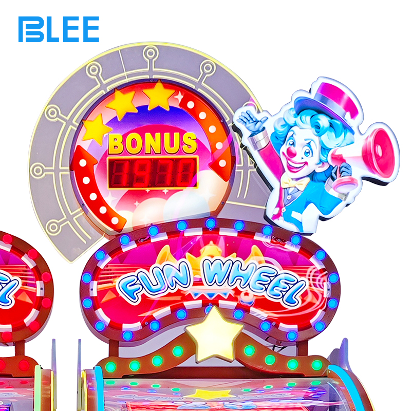 amusement game machine with big spinning wheel and flashing lights