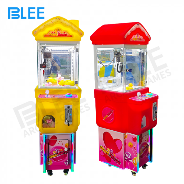 plastic prize claw machine in arcade store