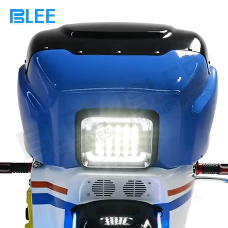 Children enjoying modern themed motorcycle swing ride