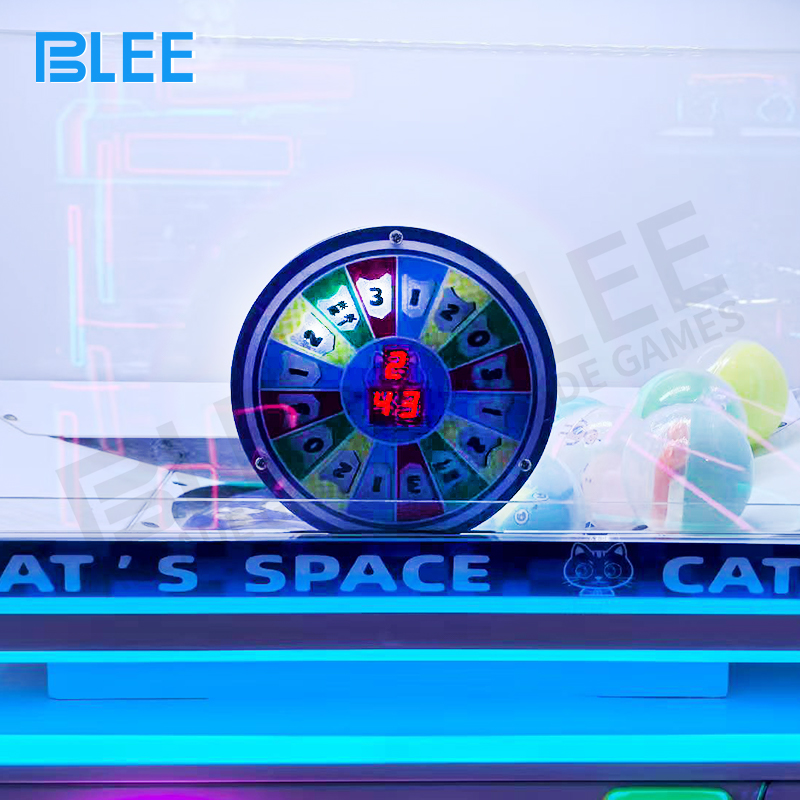 Close-up of the transparent prize chamber displaying colorful capsules