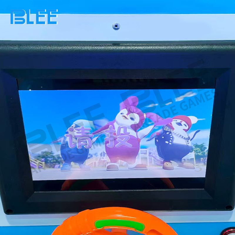 Children enjoying road roller themed swing experience