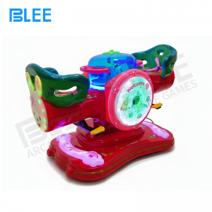 Two children enjoying bunny swing ride together