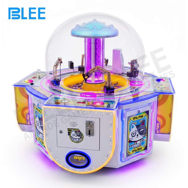 children's digging game Happy child operating the digging mechanism with adult supervision