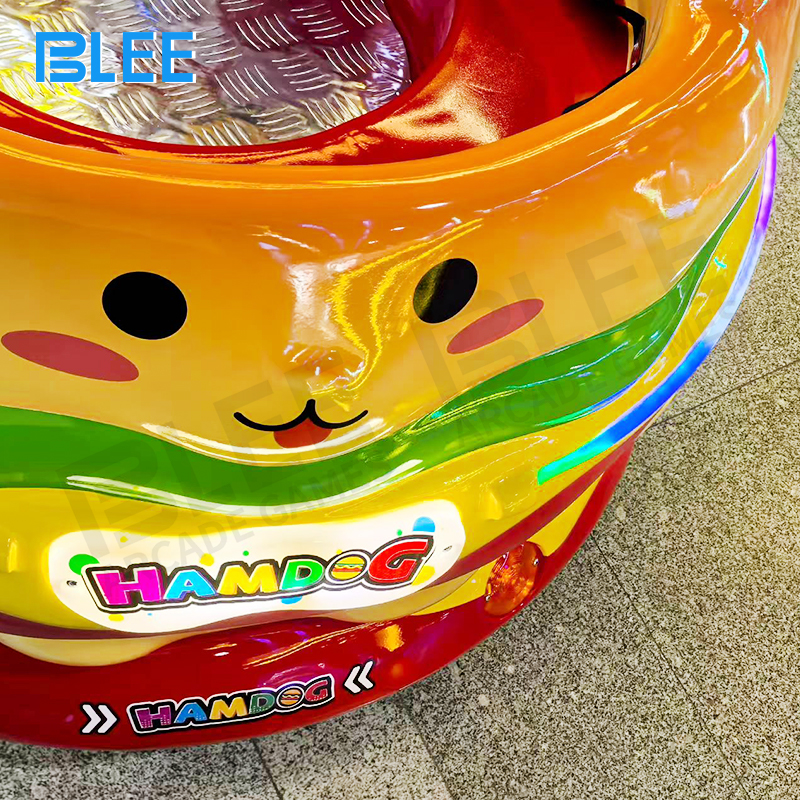 Colorful hamburger and hot dog themed spin ride cups