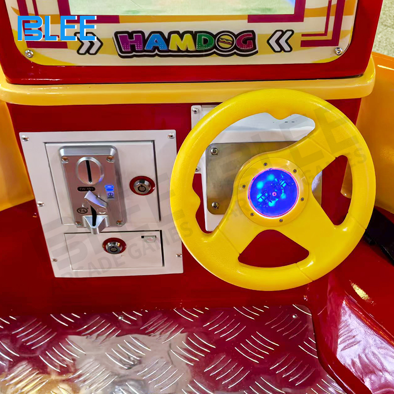 Multiple children riding BLEE food-themed spin ride