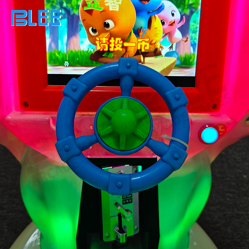 Multiple children riding BLEE pig family swing