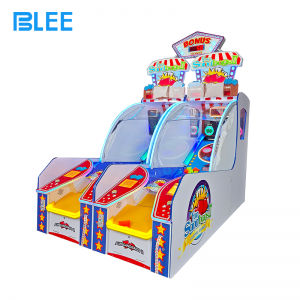 Close-up of players throwing sandbags at color-changing targets