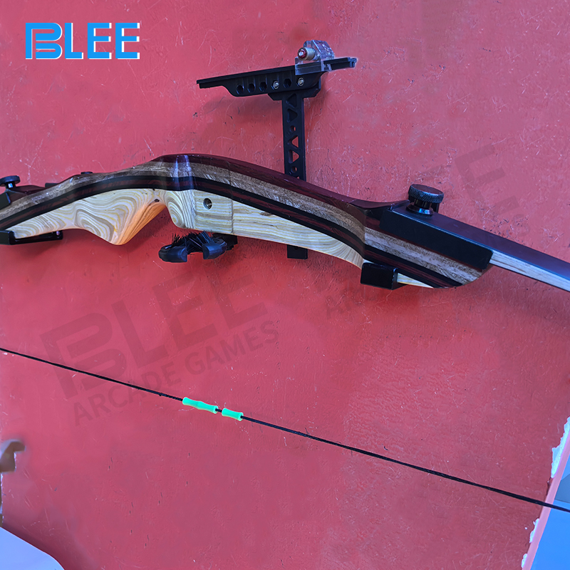 Interactive scoring system tracking shot accuracy and rocking rhythm synchronization