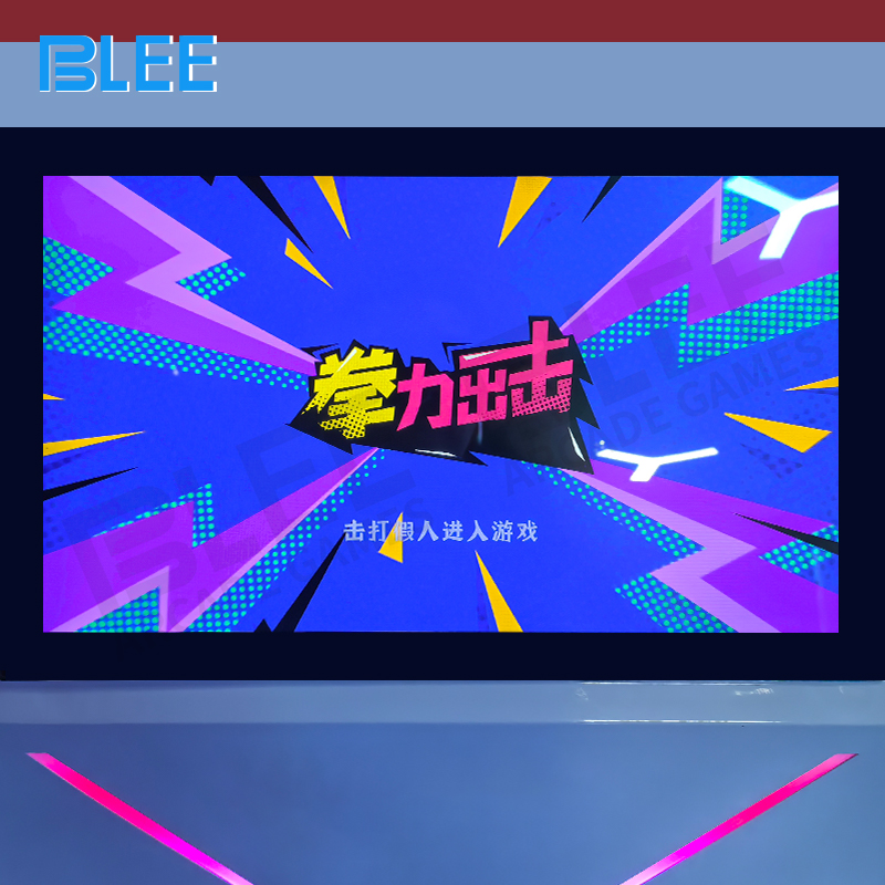 Projection wall displaying real-time scoring, rankings, and animated response effects to punches