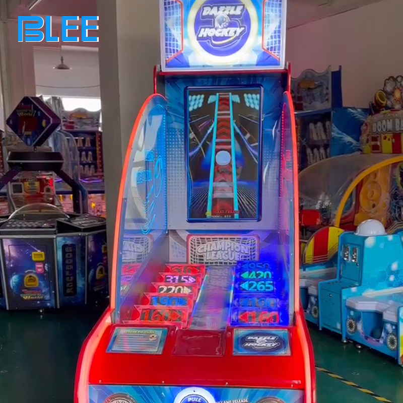 Ticket dispensing mechanism issuing rewards based on scoring accuracy