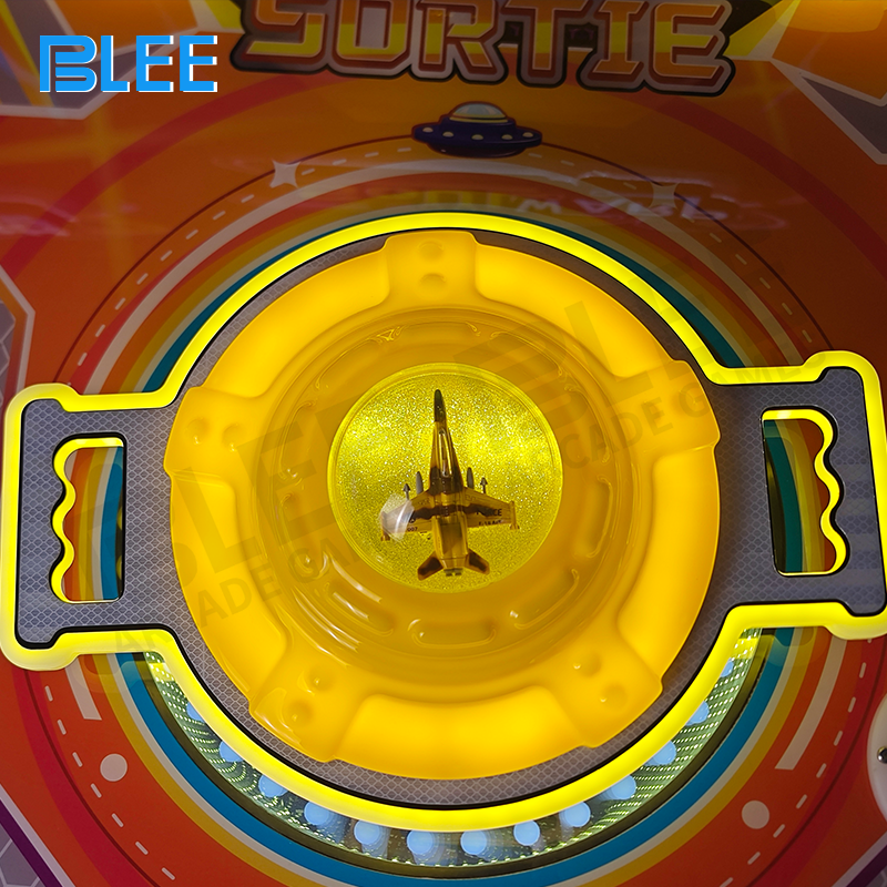 Close-up of the player using the steering wheel and pedal controls during a high-speed race