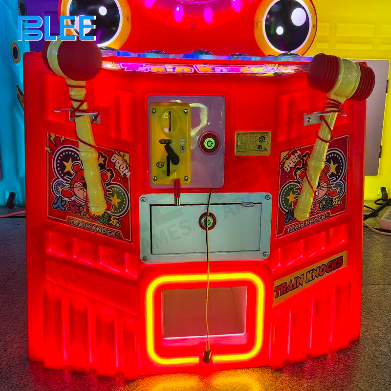 Close-up of train carriage windows with colorful mole characters popping up