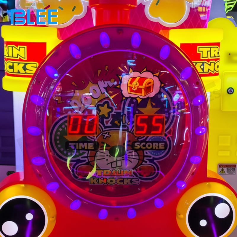 Child playing whack-a-mole game with focused expression and proper grip