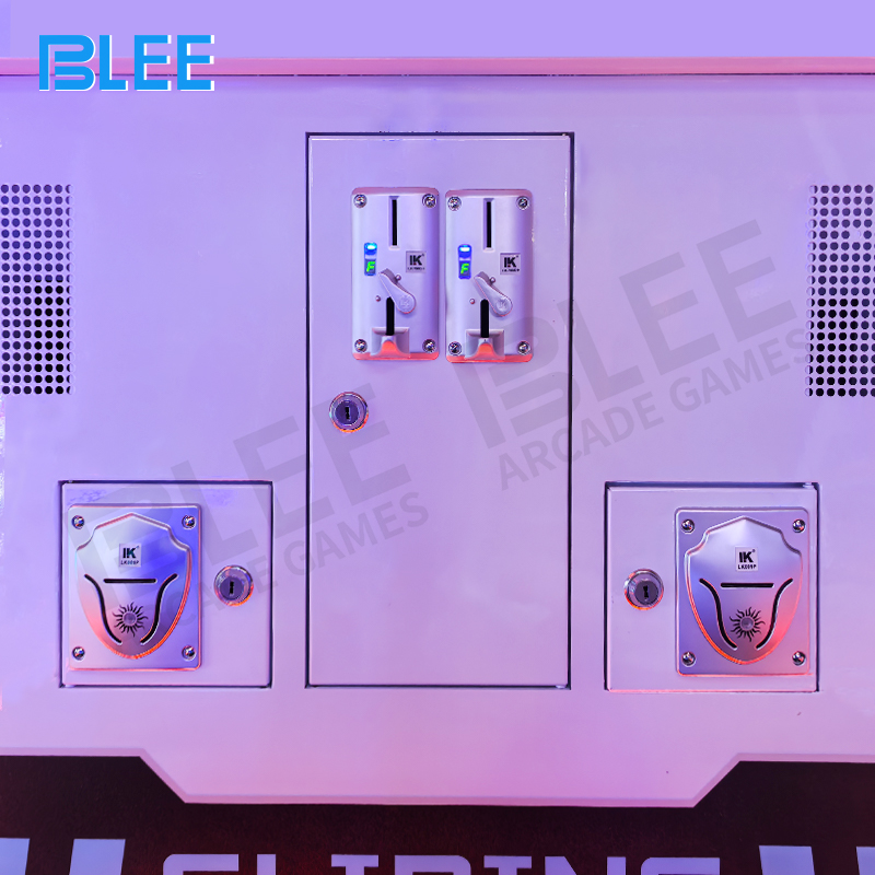 Four motion-sensing electronic eyes scanning arena with visible detection beams