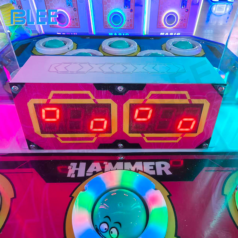 Gashapon reward system dispensing capsules based on player performance