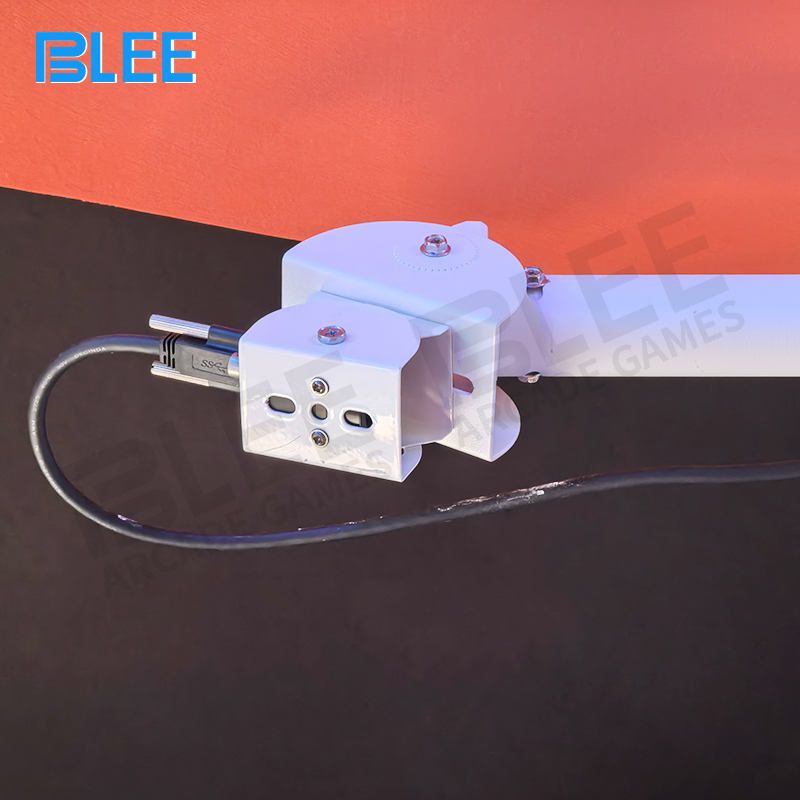 Complete professional equipment setup including computers, sensors, audio systems, and custom balls