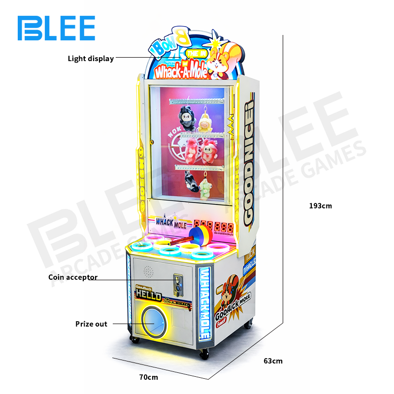 Action shot of player accurately striking a popping mole target with the mallet.