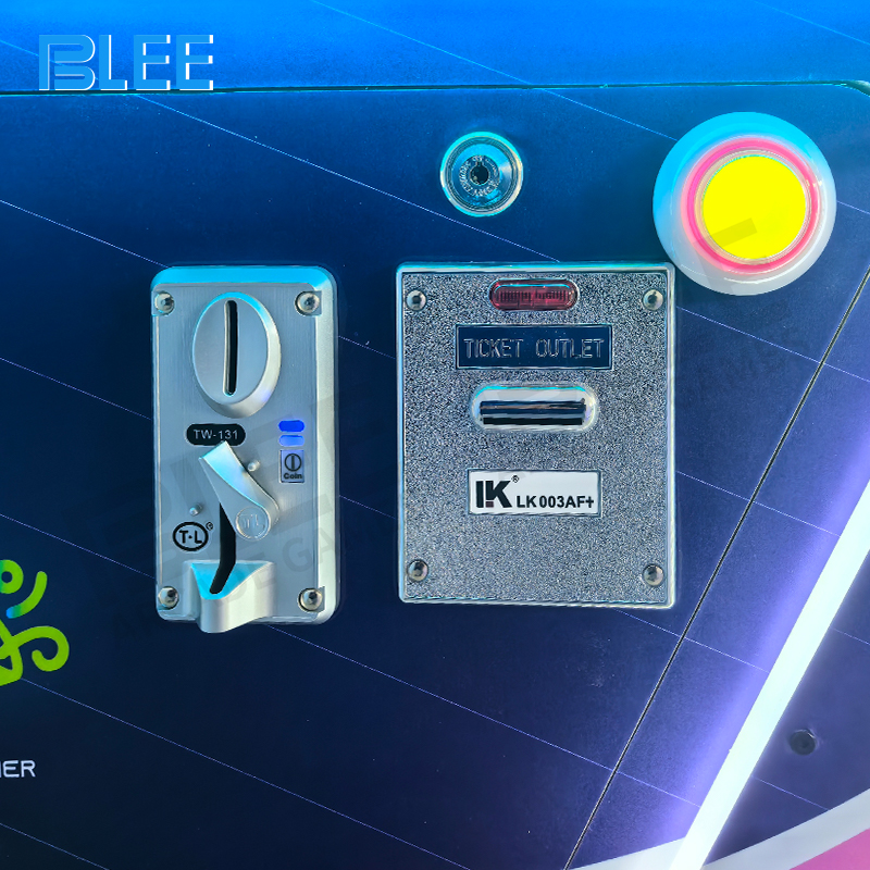 Detailed view of the commercial coin acceptor and user-friendly control interface.