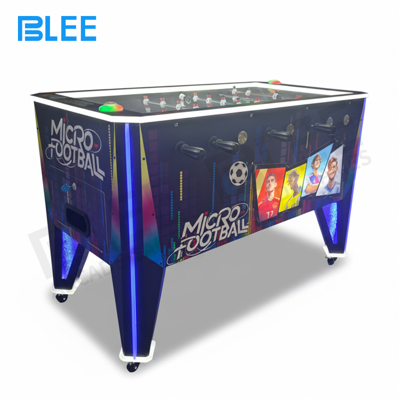 lever control arcade A pair of friends engaged in a lively match during a casual office break.