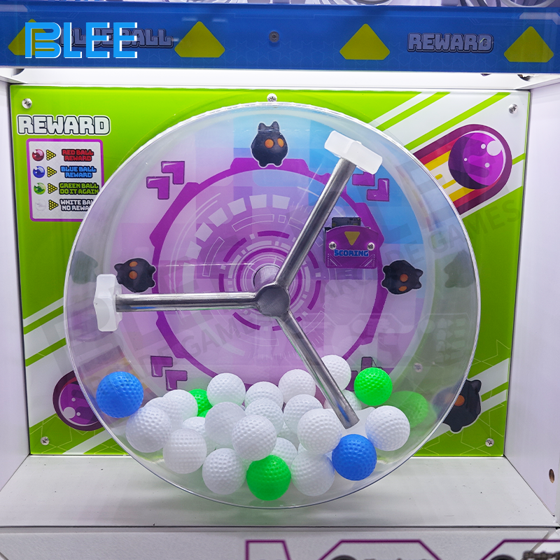 A group of guests gathered, watching the spheres mix with eager anticipation.