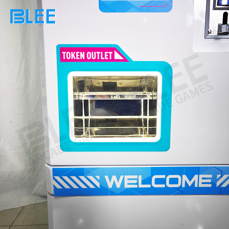 Internal overview of the large, cylindrical token storage hopper designed for easy refilling and a 15,000-token capacity.