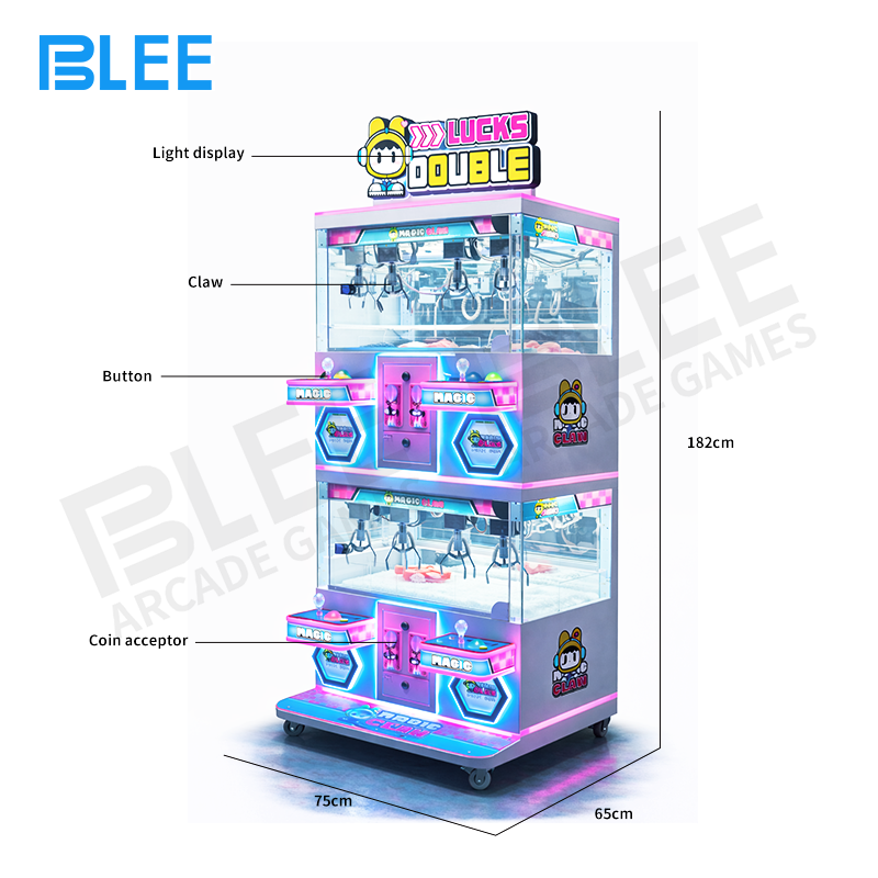 Close-up of a single player station showing the two ergonomic joysticks for claw pair control.