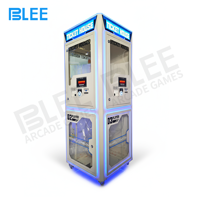 3-way coin exchange machine BLEE Triple-Side Ticket Shredder prominently positioned as the centerpiece of a busy arcade redemption zone.
