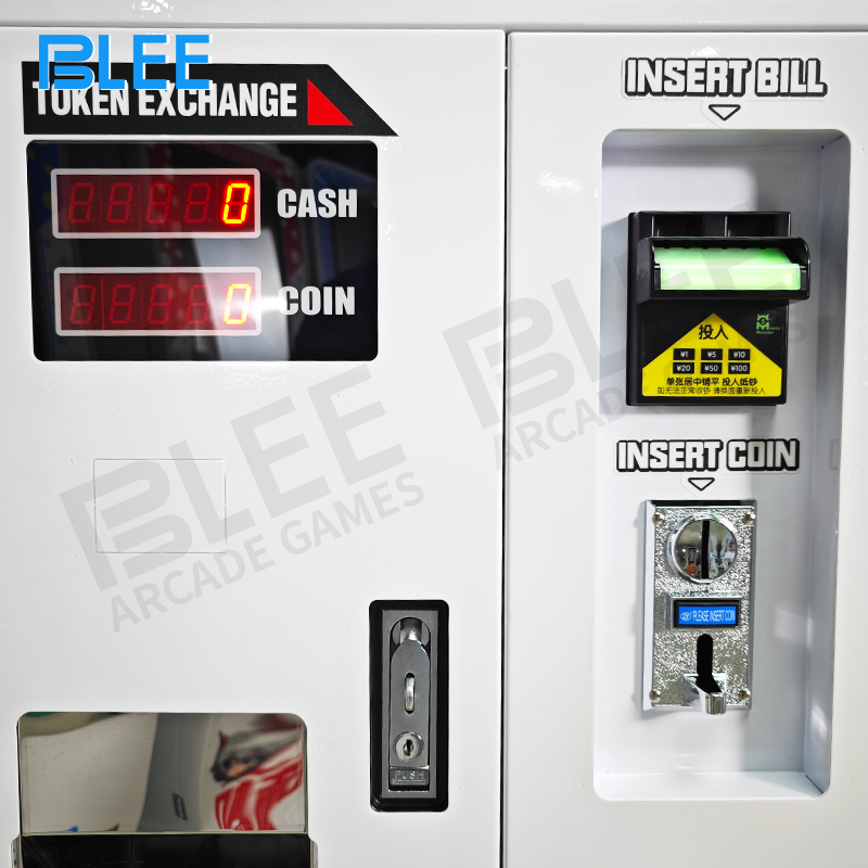 Another user inserting cash into the bill acceptor slot for token purchase.