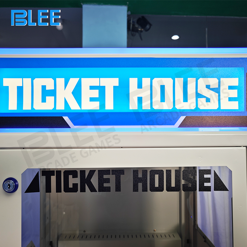 Close-up of one side's digital tube display showing real-time ticket count and coin conversion rate.