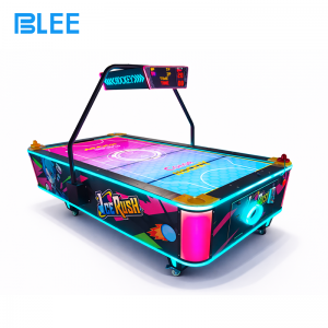 BLEE Super Air Hockey Table with premium cabinet design prominently featured in a vibrant family entertainment center.
