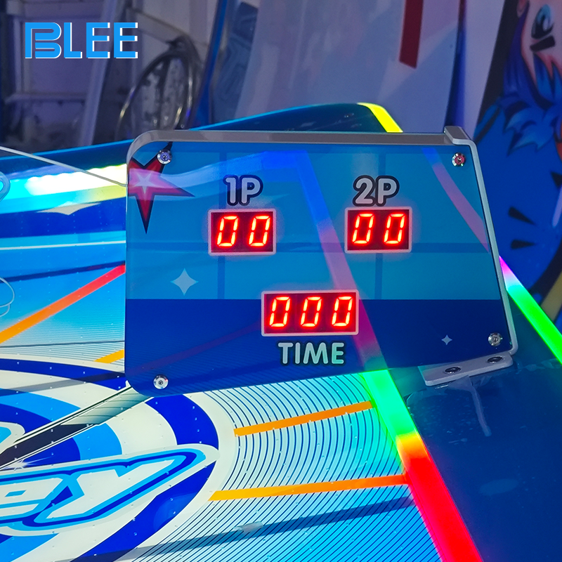 LED digital scoreboard displaying real-time points for both players during intense matches.