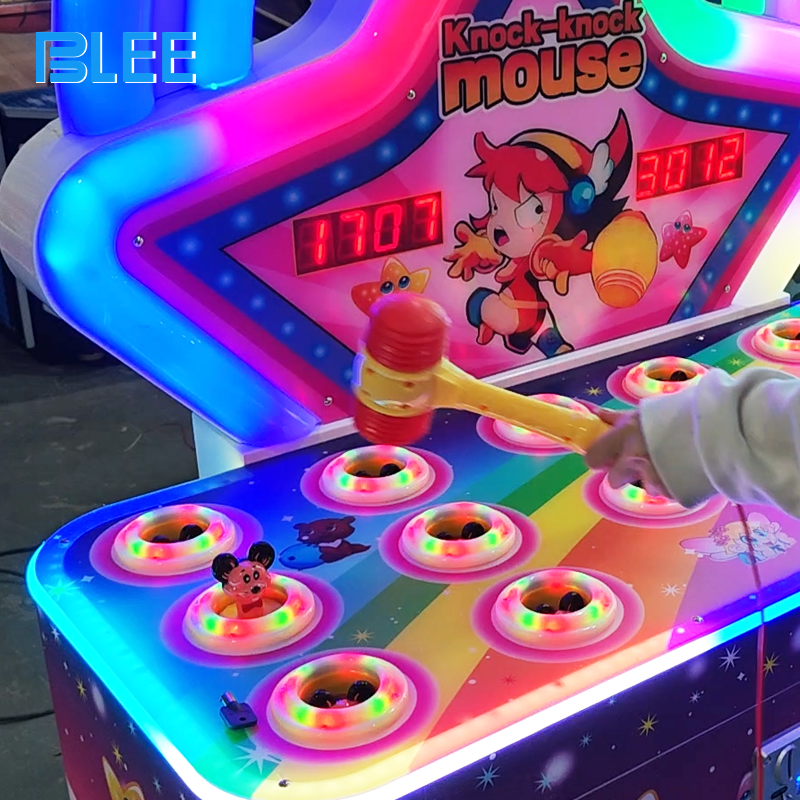 Single player enjoying practice mode while LED mouse holes light up in sequence with cheerful music playing.