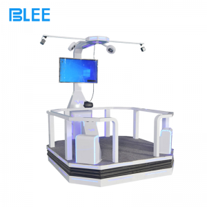 Full front view showcasing the motion platform, professional HTC headset, and 55-inch spectator display.