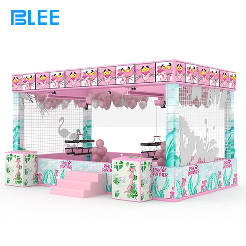 human claw machine Side profile highlighting the heavy-duty steel frame construction and 360-degree safety barrier design.