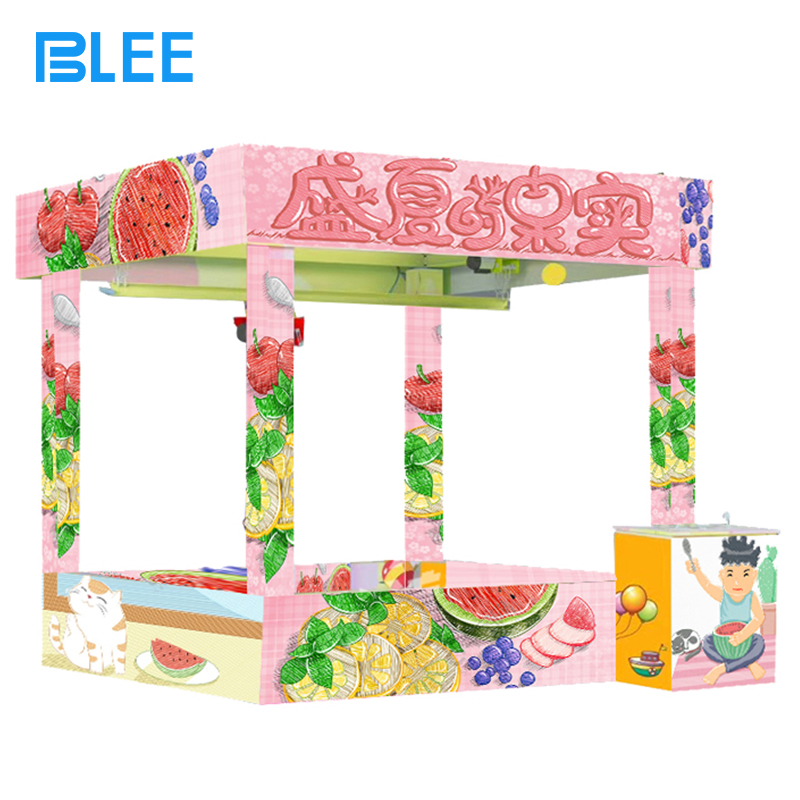 human crane game Crowd of spectators pressed against the transparent walls, cheering and recording the action on phones.