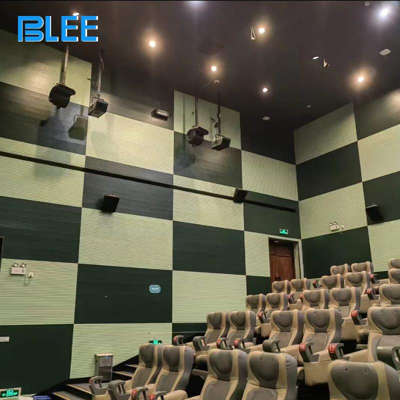 Full front view showcasing six dynamic motion chairs, mega projection screen, and integrated environmental effect system.