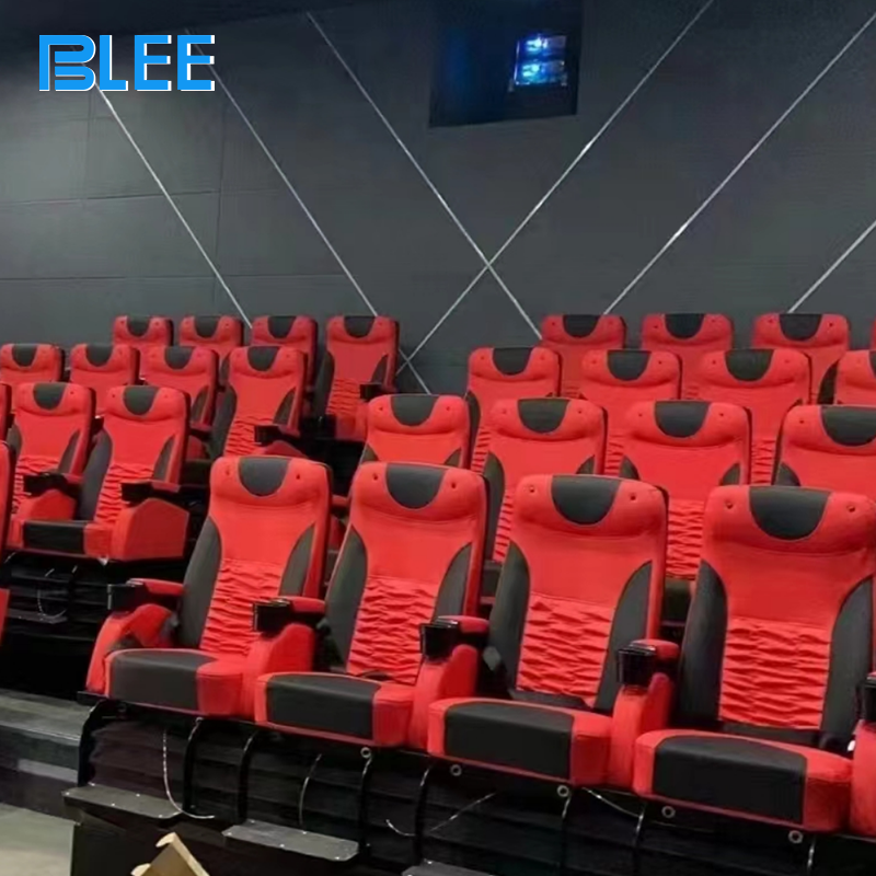 Six viewers wearing 3D glasses, gripping armrests as their seats tilt during an intense roller coaster program.