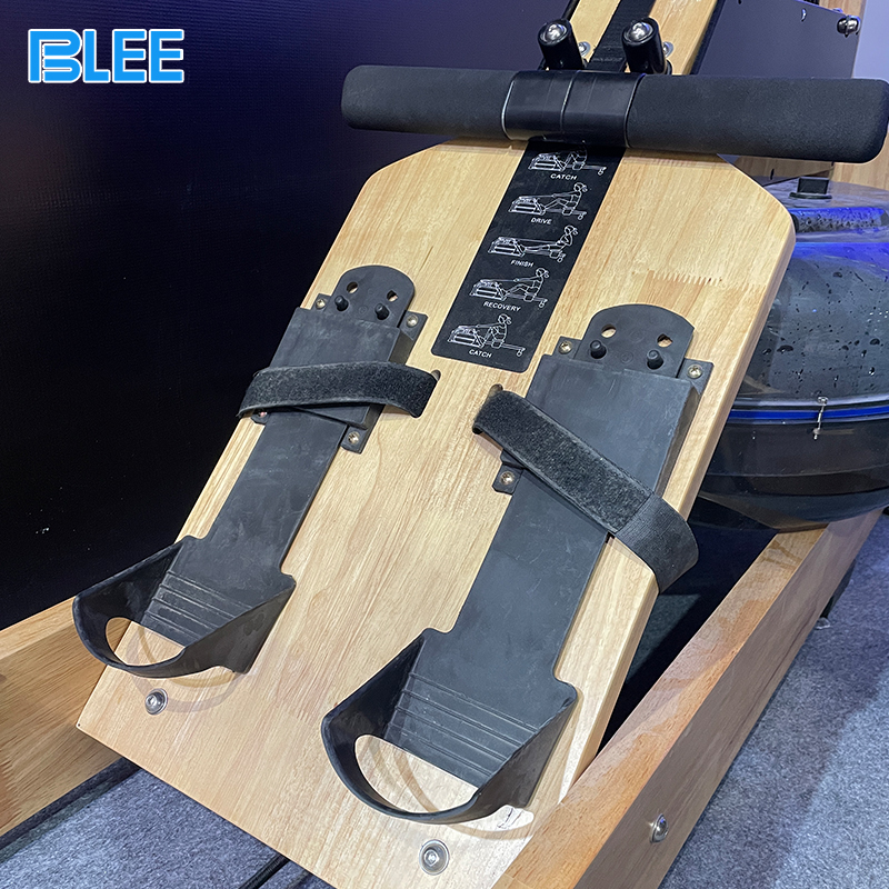 Full front view showcasing the ergonomic rowing seat, adjustable footrests, magnetic resistance mechanism, and real-time performance monitor.